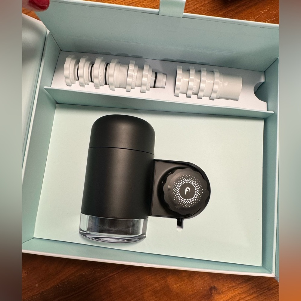 New in box: FilterBaby sink water filter with extra filter. Black
